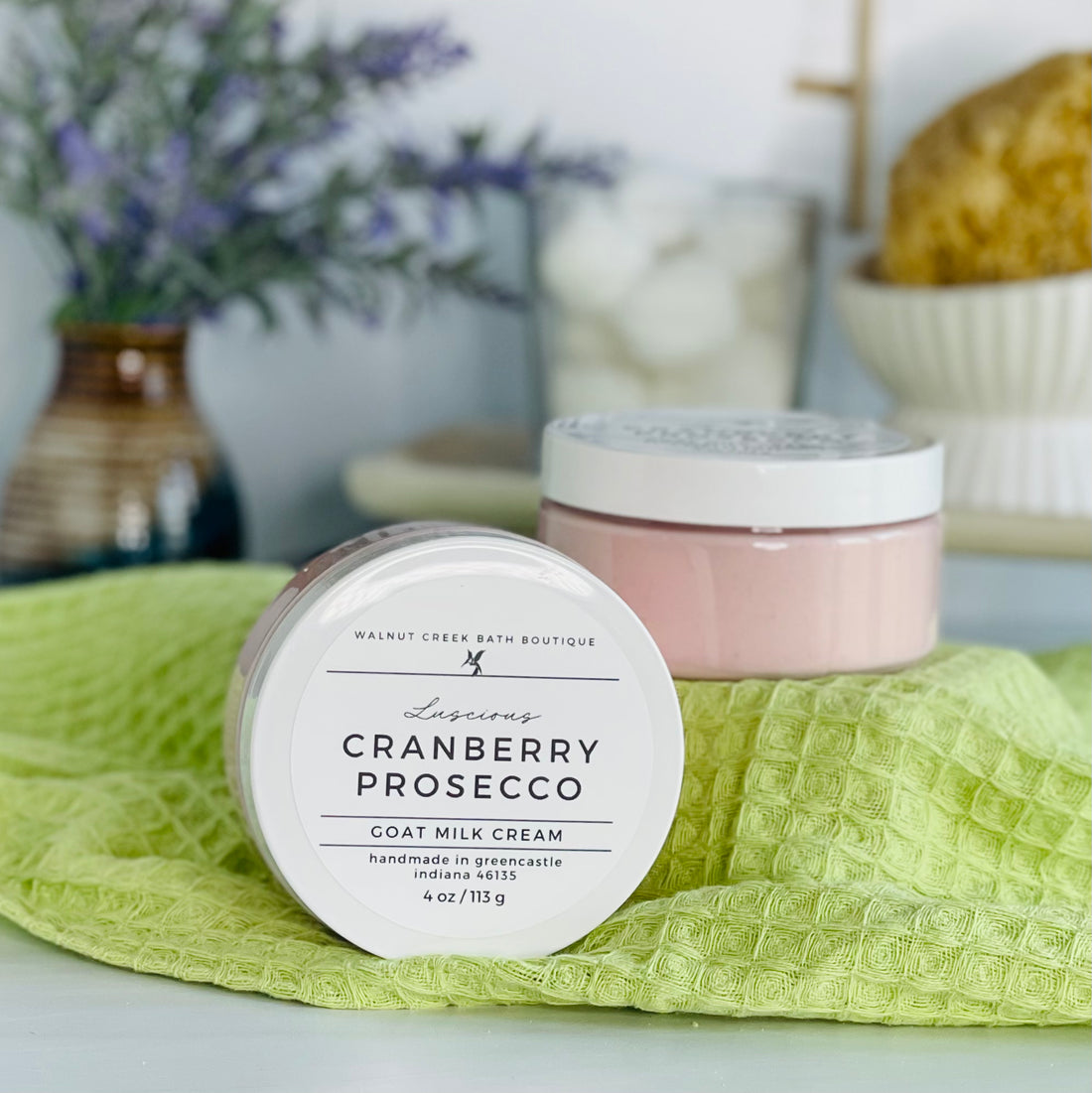 one cranberry prosecco cream is sitting on it&