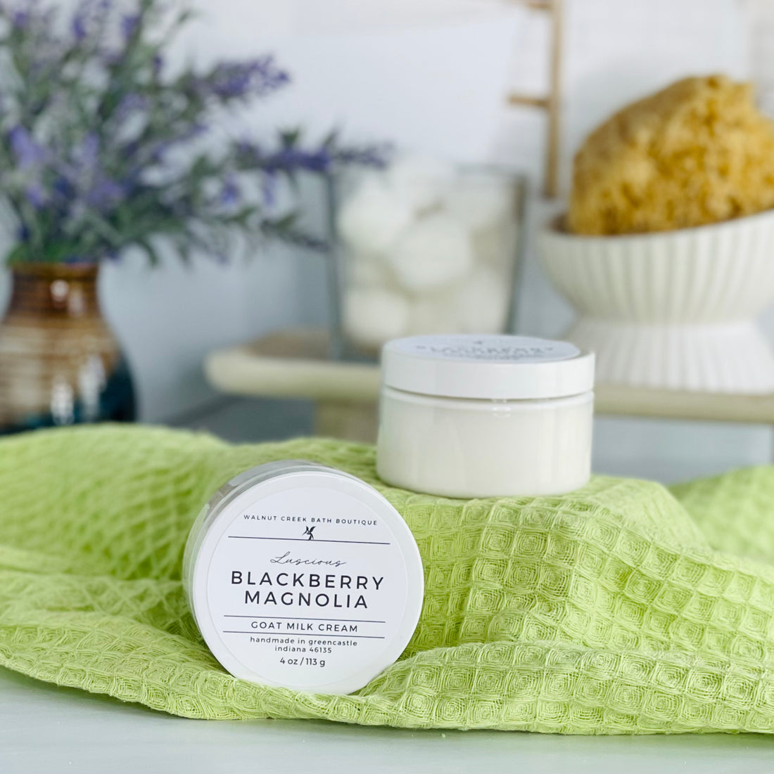 one blackberry magnolia cream is sitting on it&