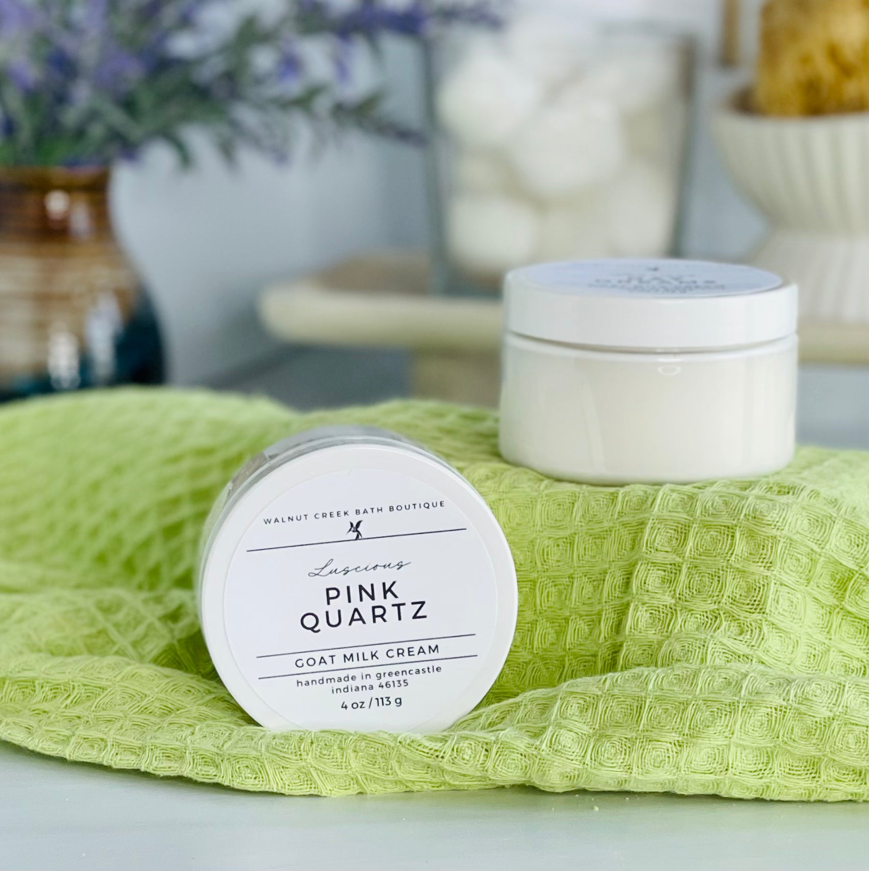 one pink quartz cream is sitting on it&