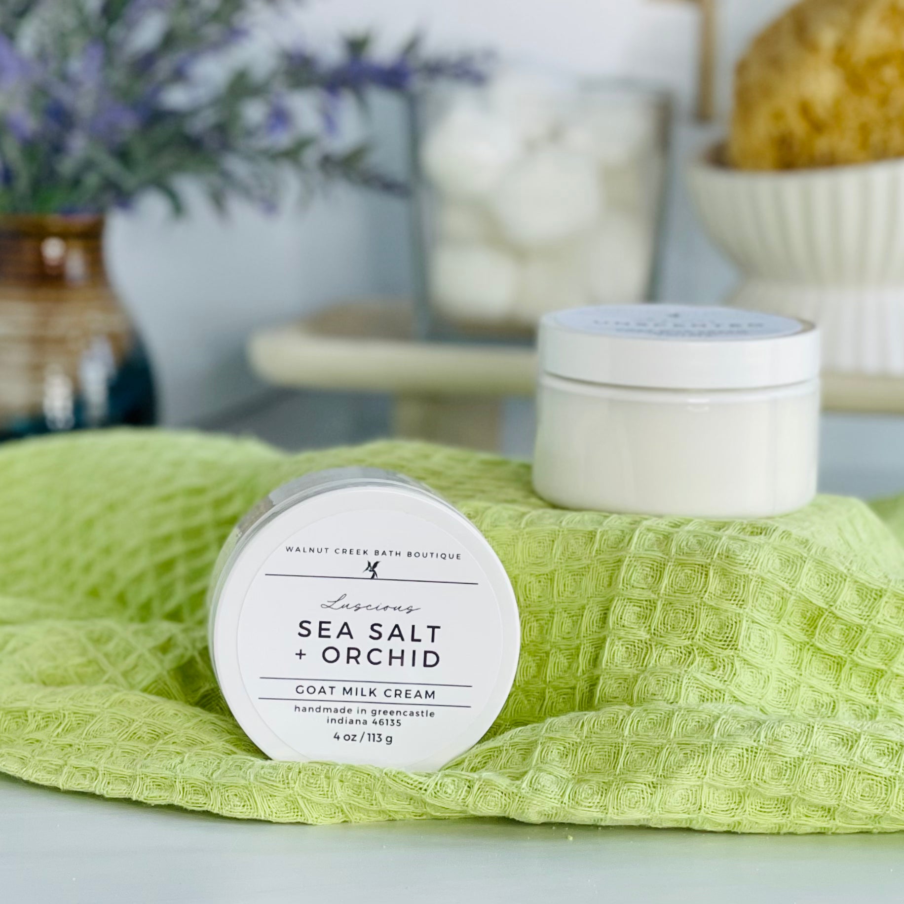 one seasalt and orchid cream is sitting on it&