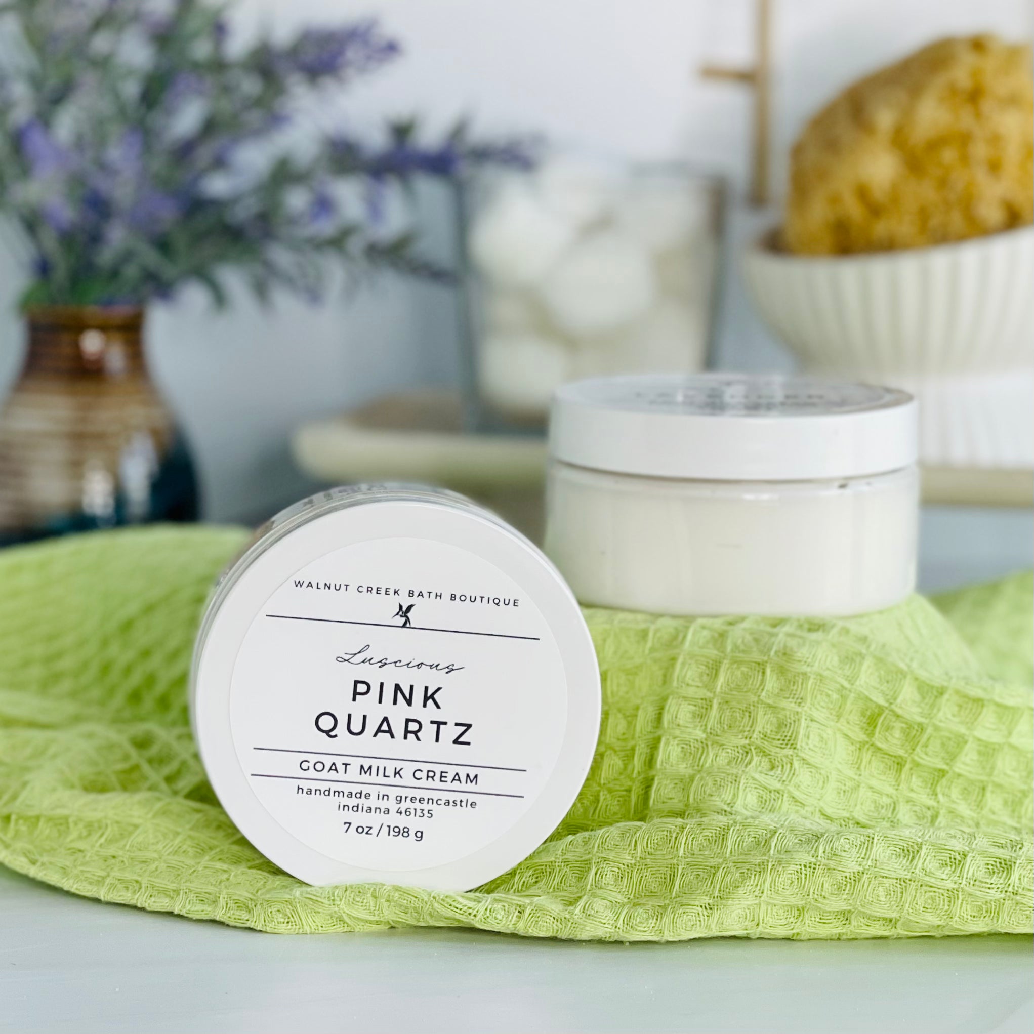 one pink quartz cream is sitting on it&