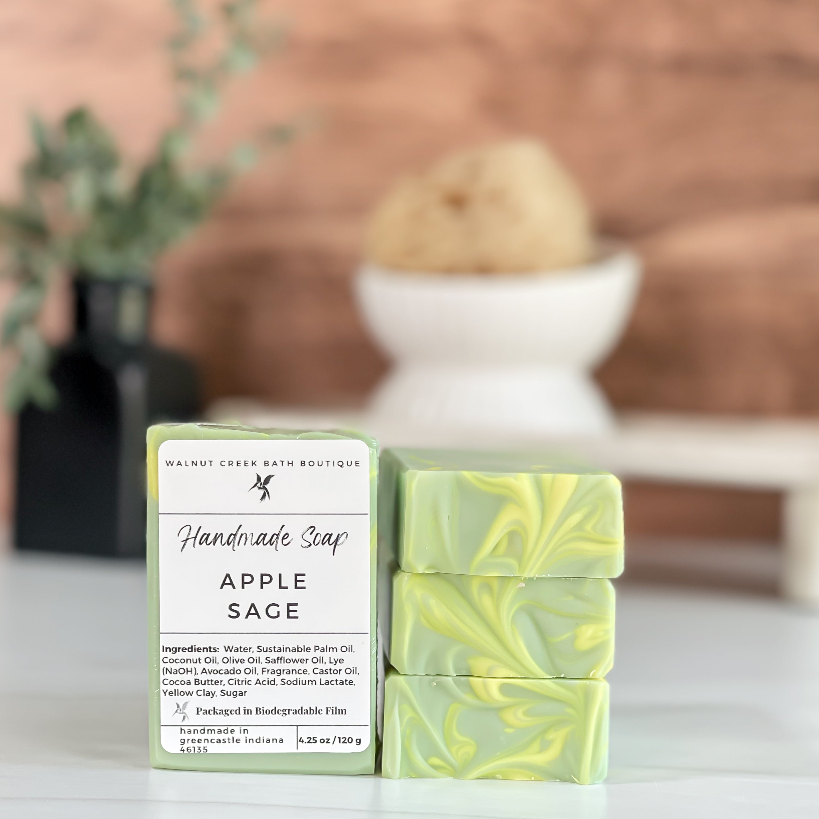 apple sage soap stack to show pretty green color with a yellow swirled top