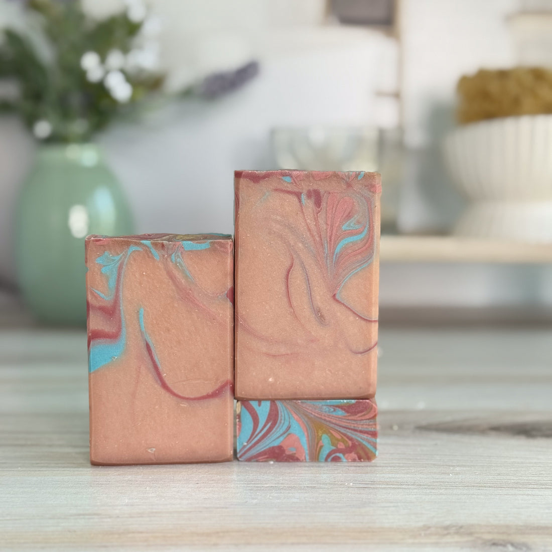 3 bars of soap, light brown in color with red and blue swrils