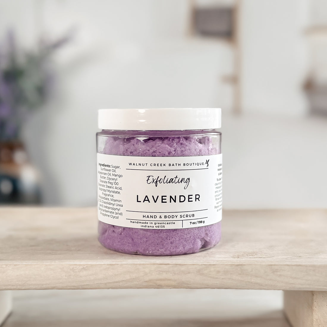 purple lavender scrub on a wooden tray