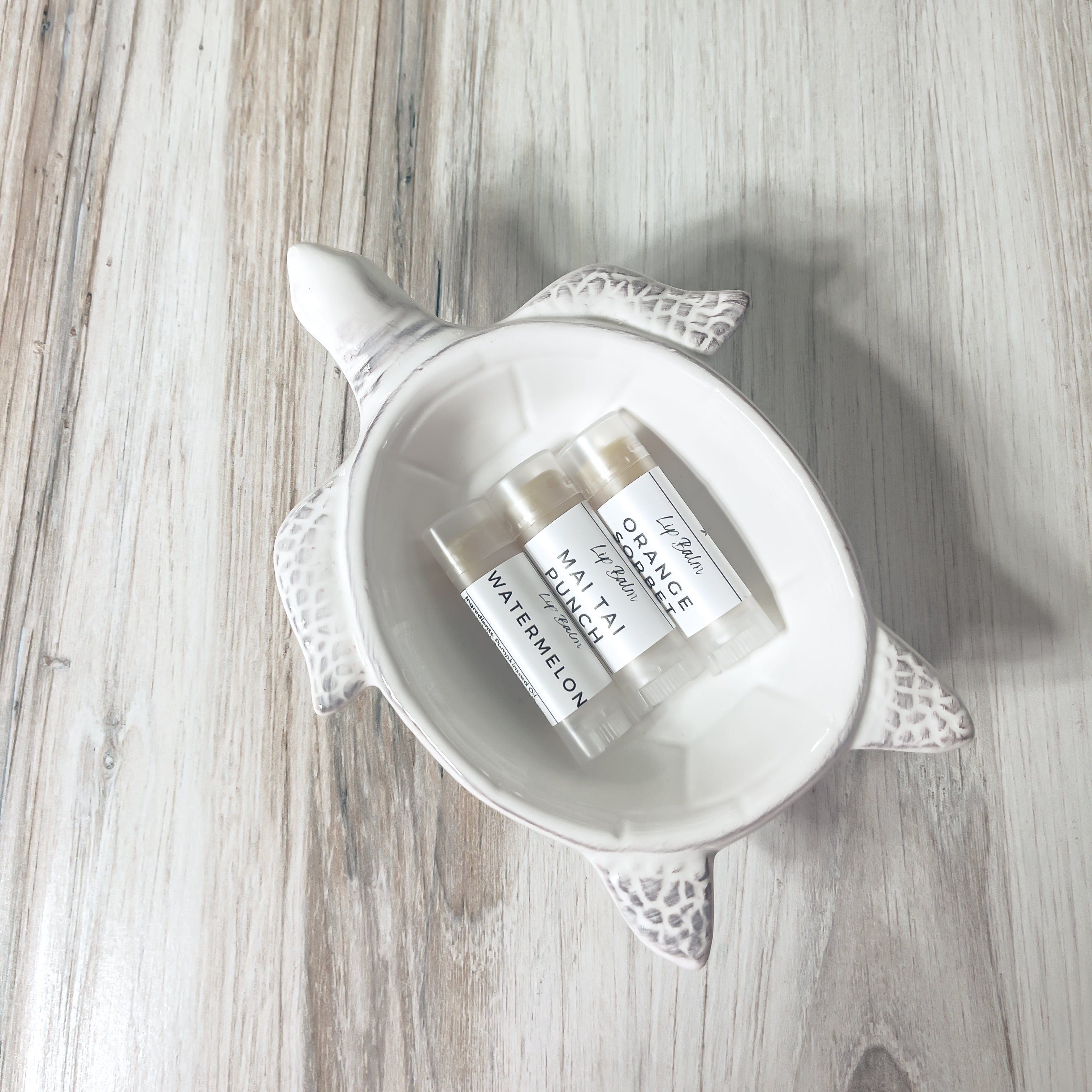 3 natural lip balms in a cute turtle soap dish