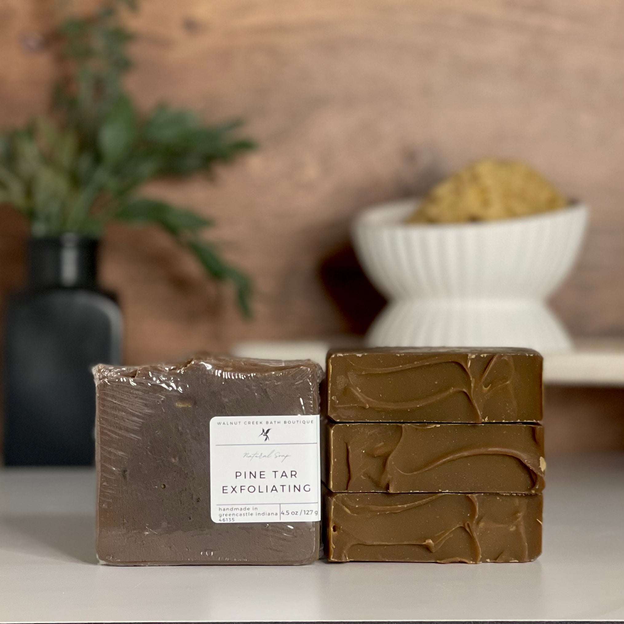 a pine tar soap is standing tall packaged in it&