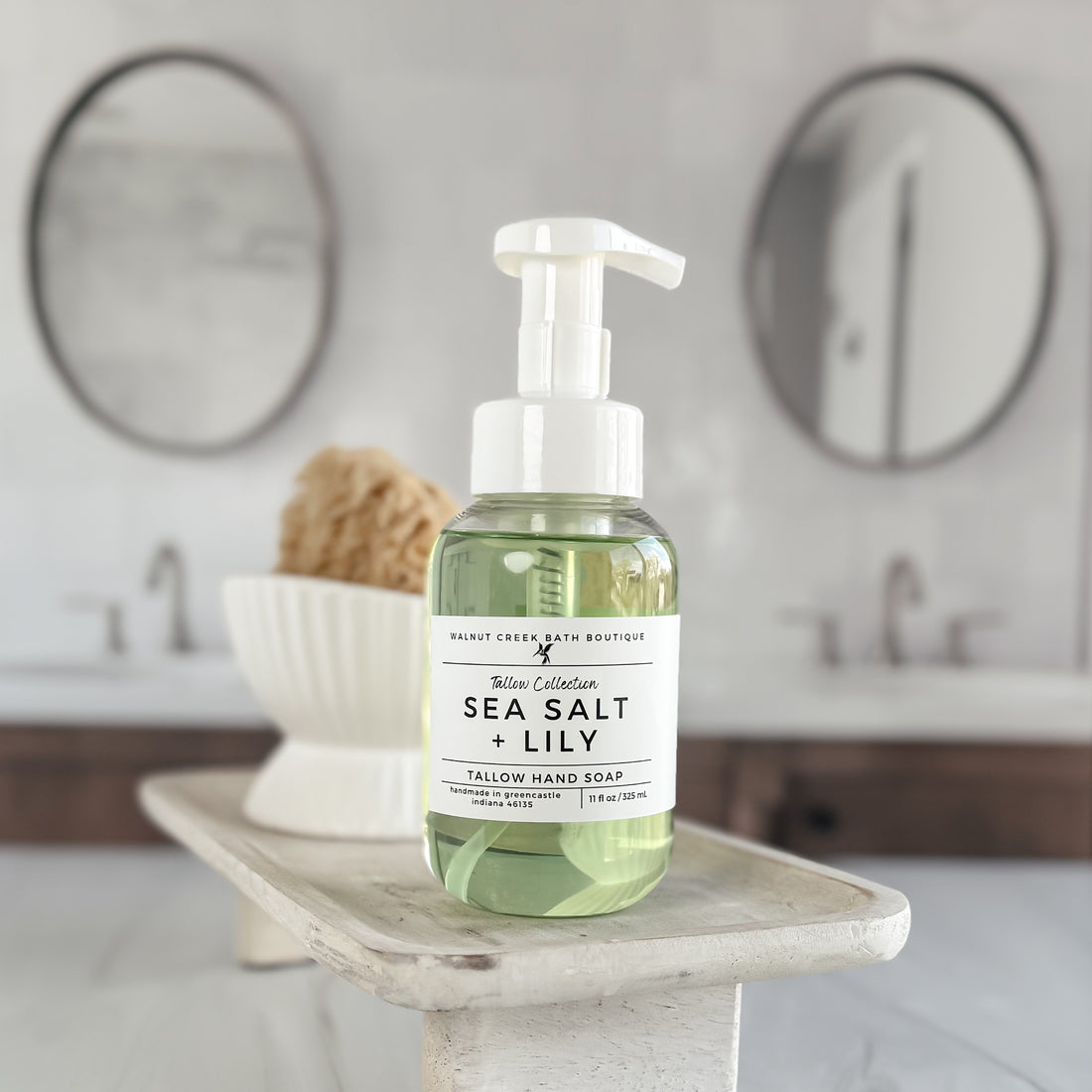 green sea salt and lily foaming soap on a tray