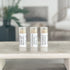 3 tallow lip balms on a tray in a line to show simple labels