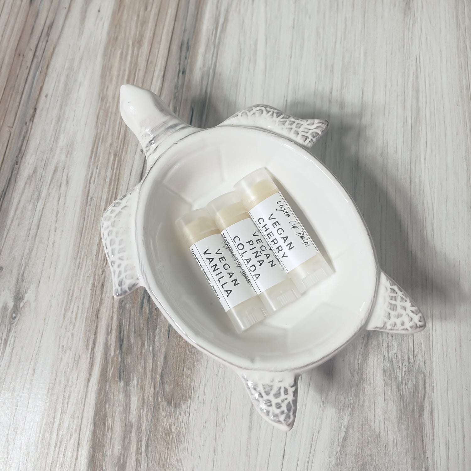 3 vegan lip balms in a cute turtle soap dish
