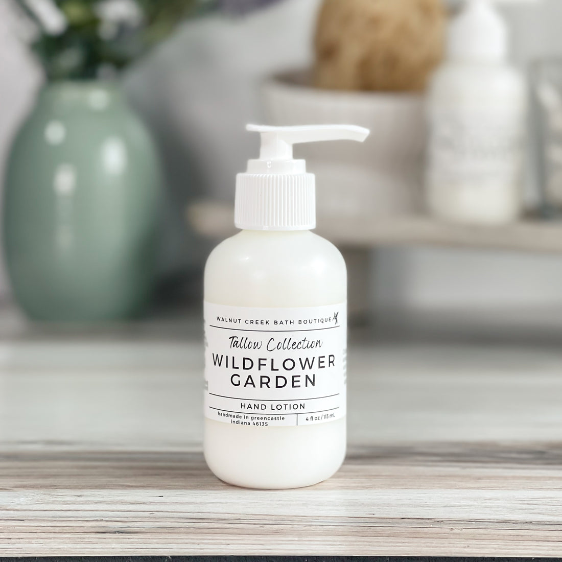 wildflower garden tallow lotion in white bottle with white pump top