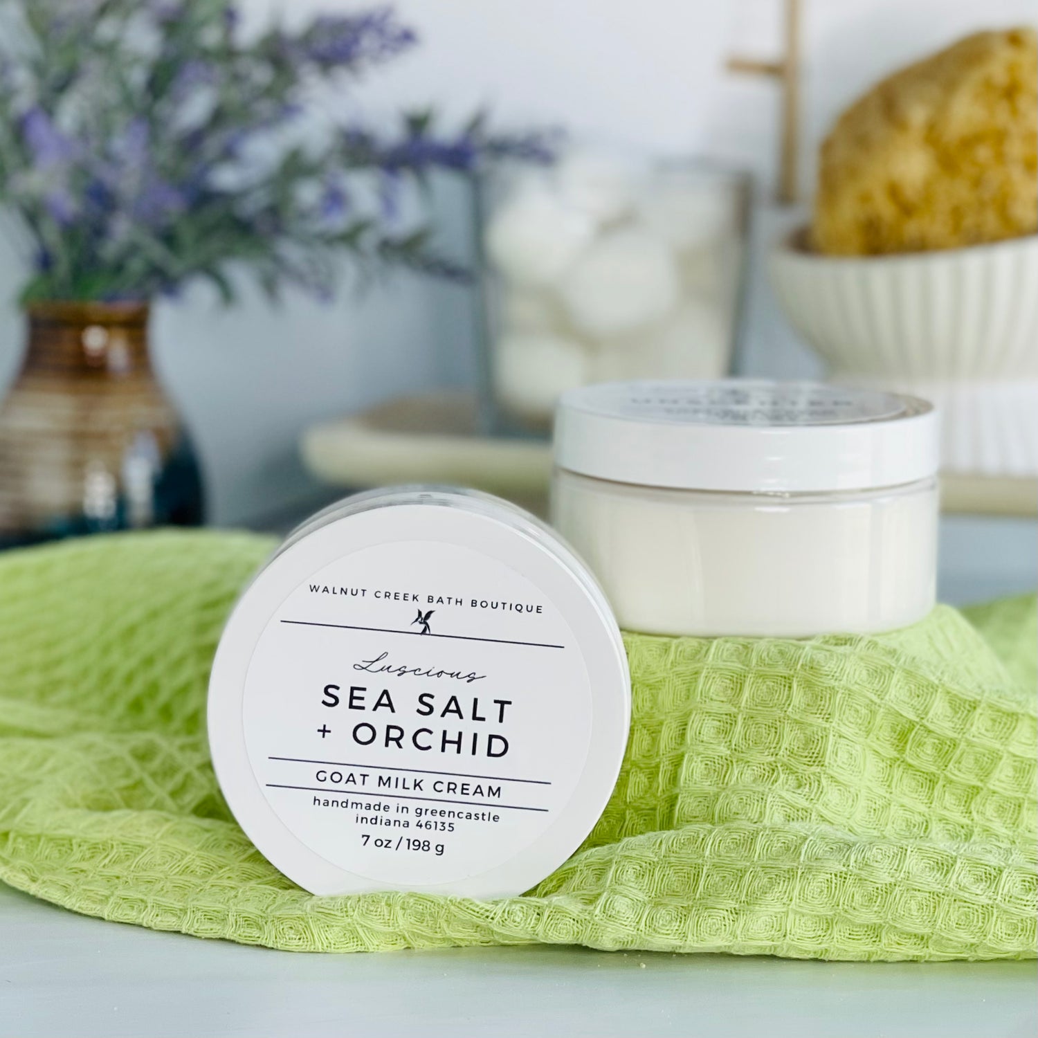 one seasalt and orchid cream is sitting on it&