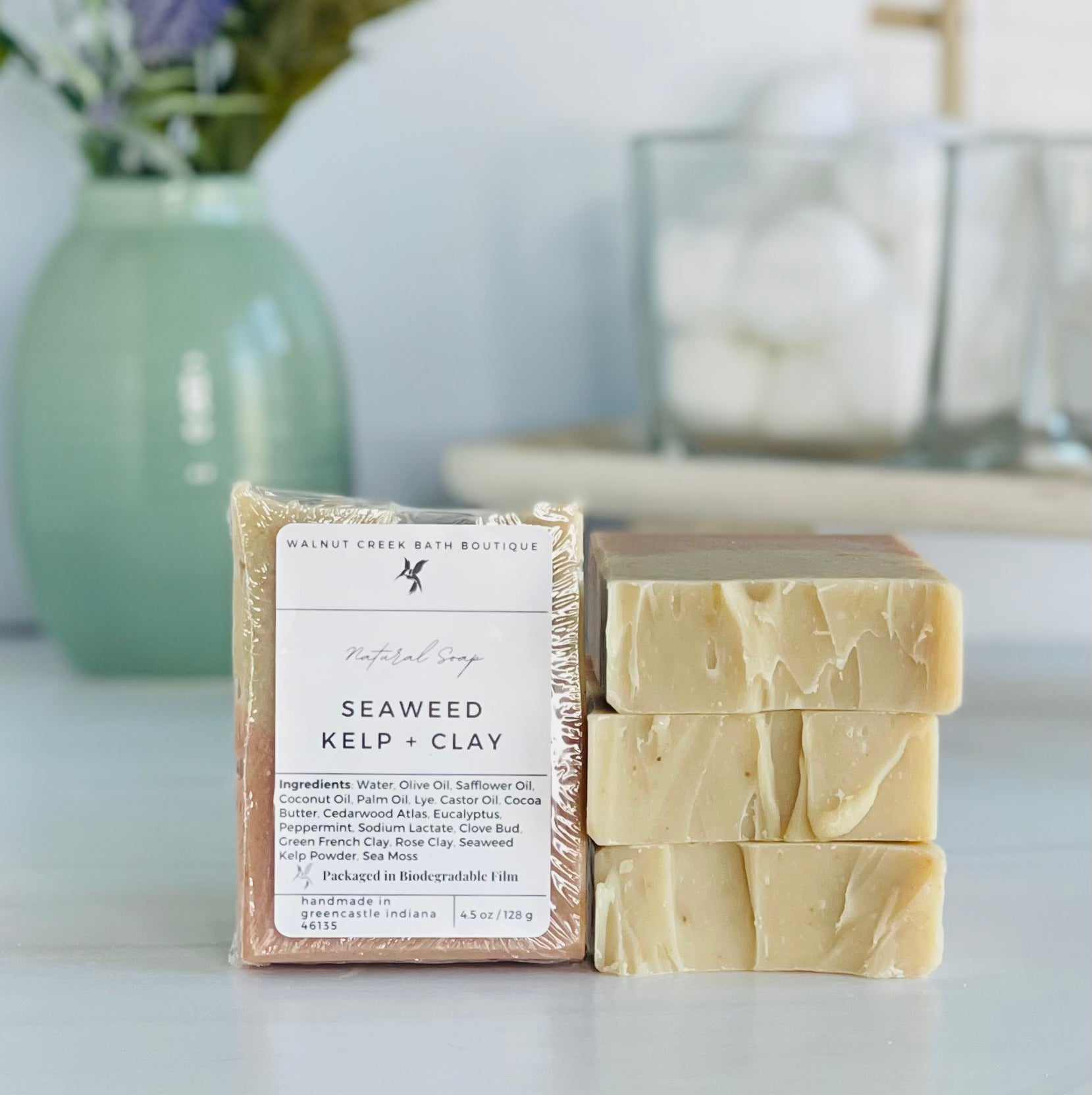 a seaweed kelp and clay soap is standing tall packaged in it&