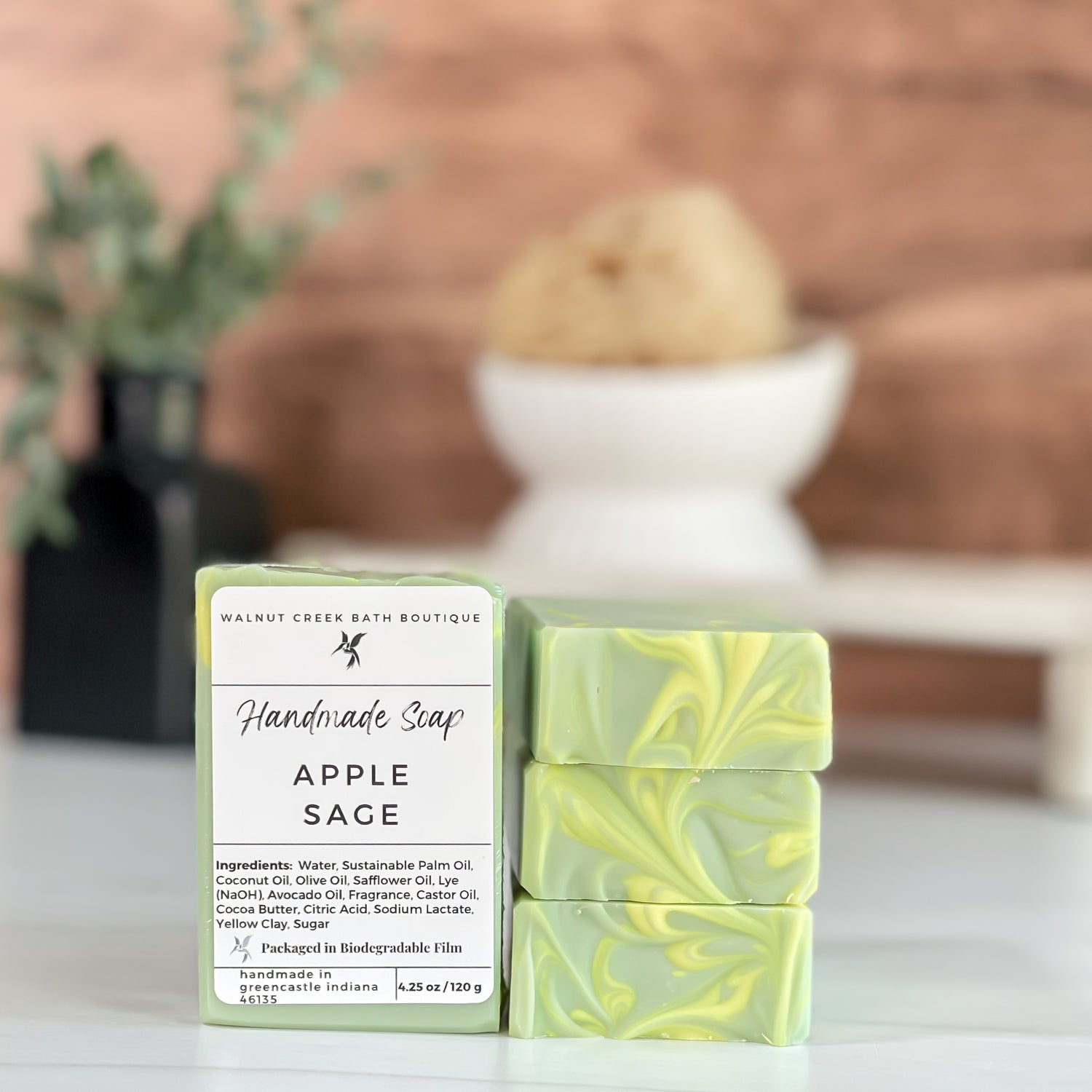 apple sage soap stack to show pretty green color with a yellow swirled top