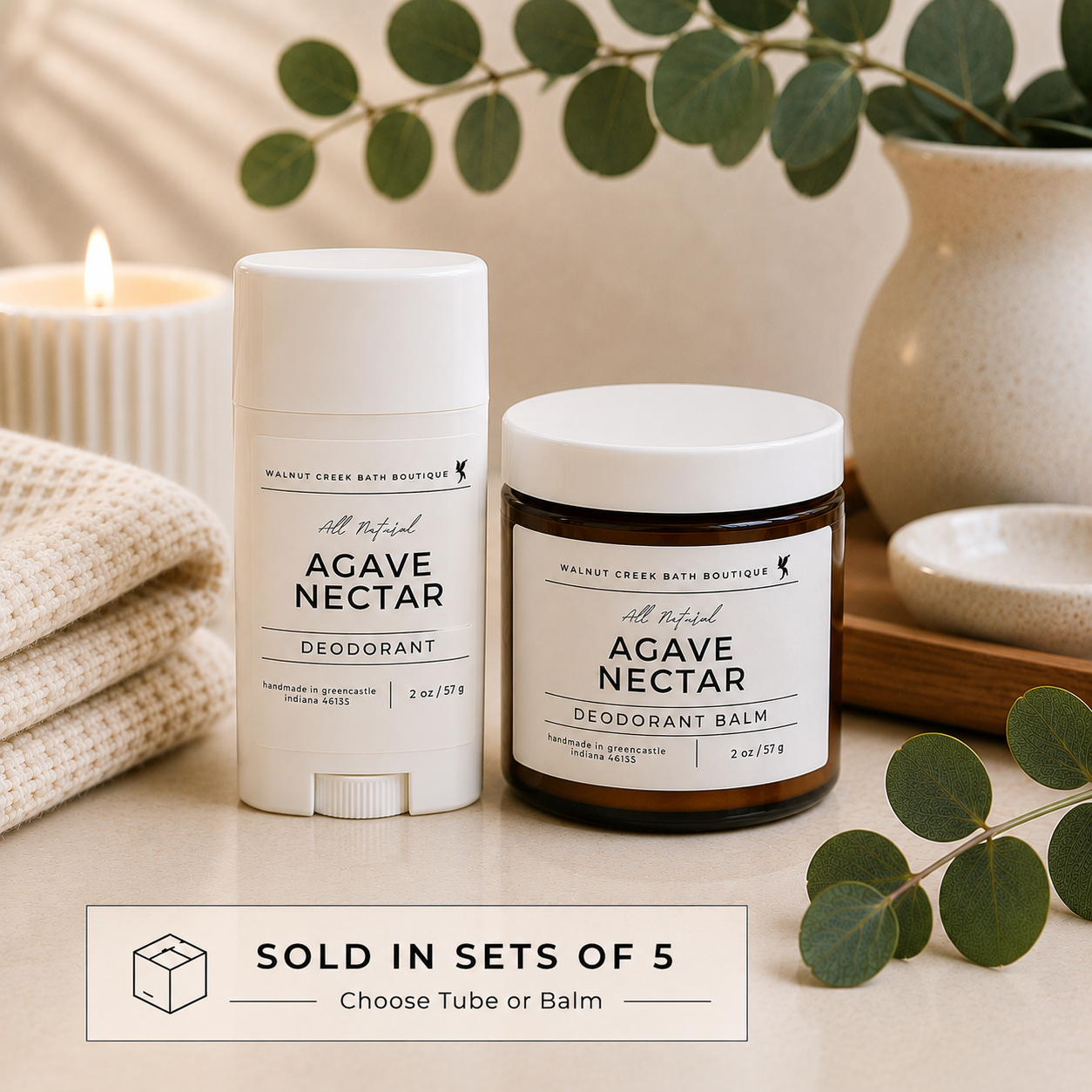 Agave Nectar deodorant and balm with a candle and plant in the background