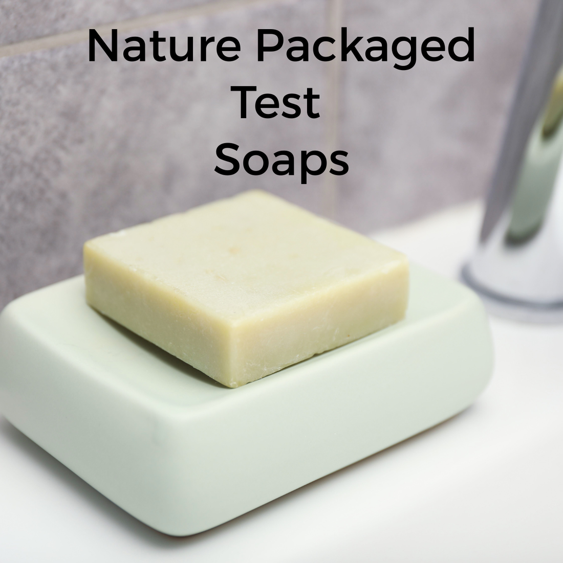 Bar of soap on a white soap dish with &