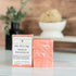 peach magnolia soaps stacked to show the pretty peach color with white swirls on tops