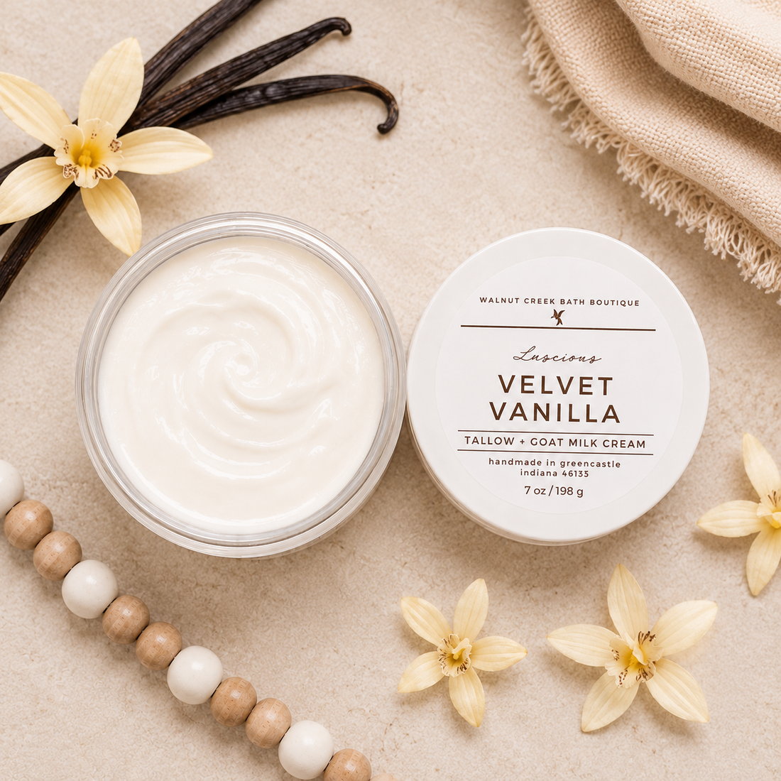 Jar of Velvet Vanilla cream with vanilla beans and flowers on a beige background